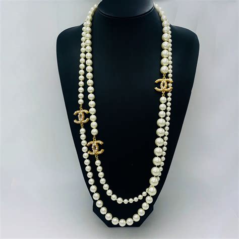 chanel black pendant necklace|long chanel necklace with pearls.